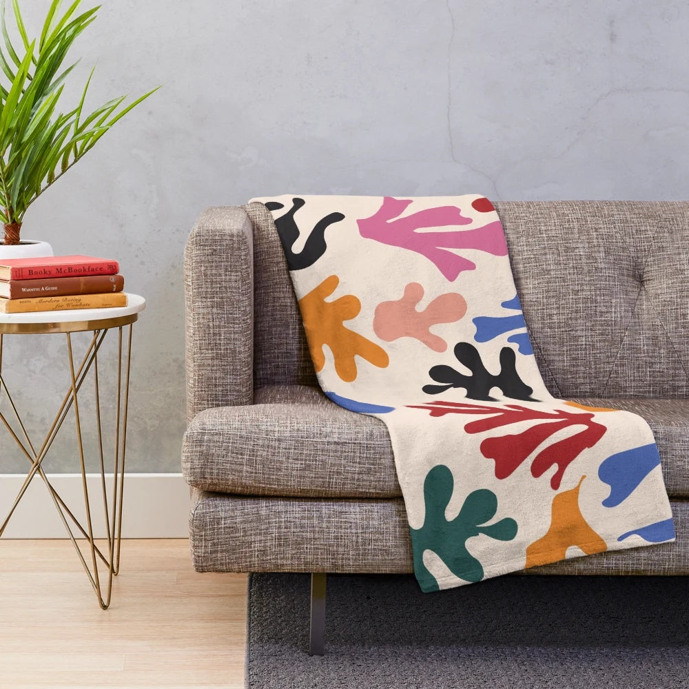 Matisse-inspired plush blanket with vibrant abstract patterns