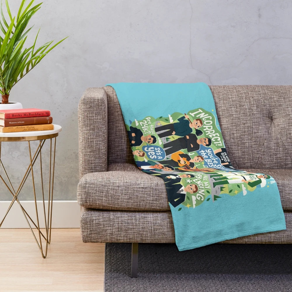 Colorful plush blanket featuring a collage of typography and character art from a popular TV show