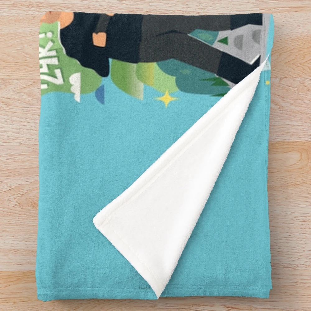 Colorful plush blanket featuring a collage of typography and character art from a popular TV show