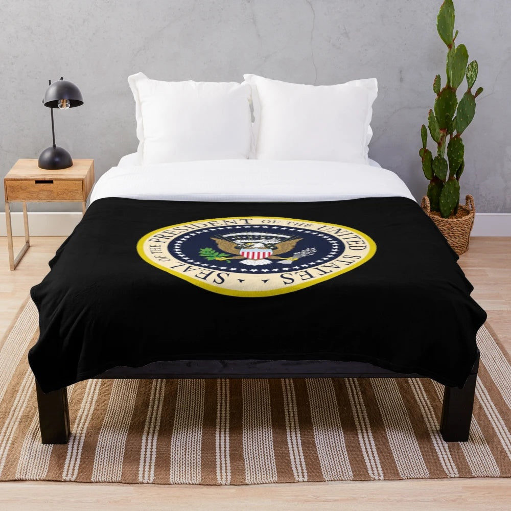 Plush blanket featuring the stylized seal of the President of the United States