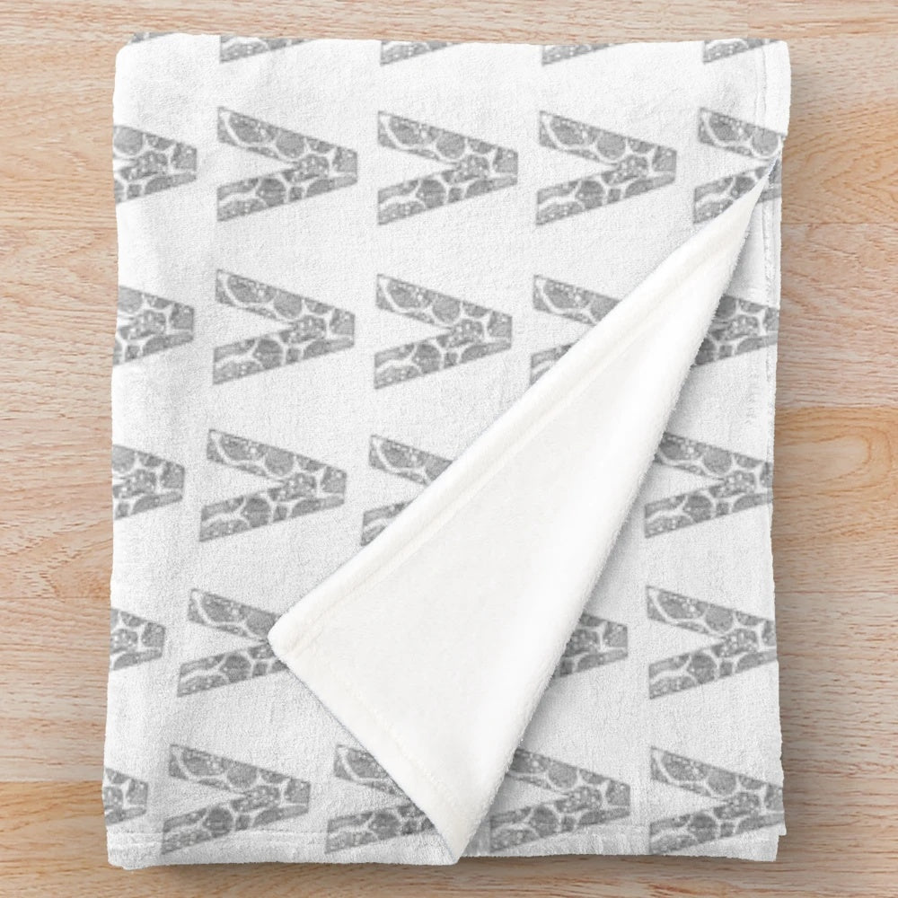 Black and white stylized letter V pattern plush blanket