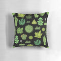 A decorative pillow featuring a pattern of succulents and cacti, perfect for plant lovers.