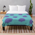 Sully the Monster from Pixar's Monsters Inc. featured on a cozy plush blanket
