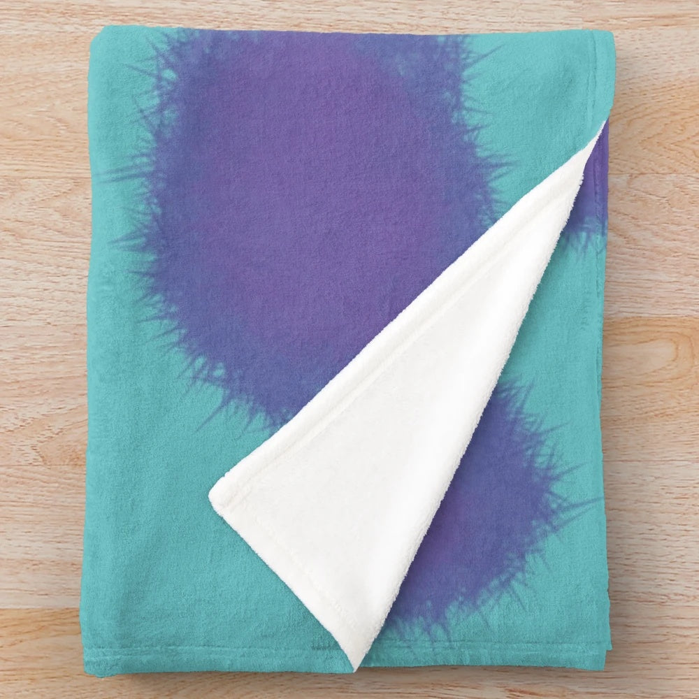 Sully the Monster from Pixar's Monsters Inc. featured on a cozy plush blanket