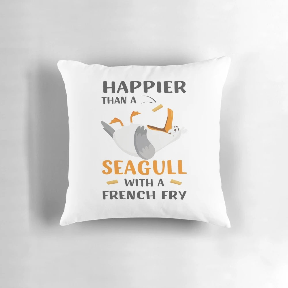 Summertime seagull meme design on a pillow, with the phrase 'Happier Than a Seagull with a French Fry