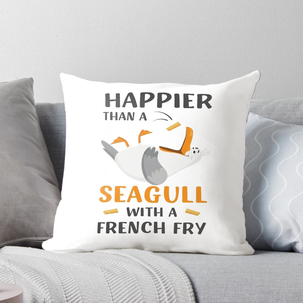 Summertime seagull meme design on a pillow, with the phrase 'Happier Than a Seagull with a French Fry