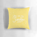 Vibrant "You Are My Sunshine" graphic throw pillow in yellow and white