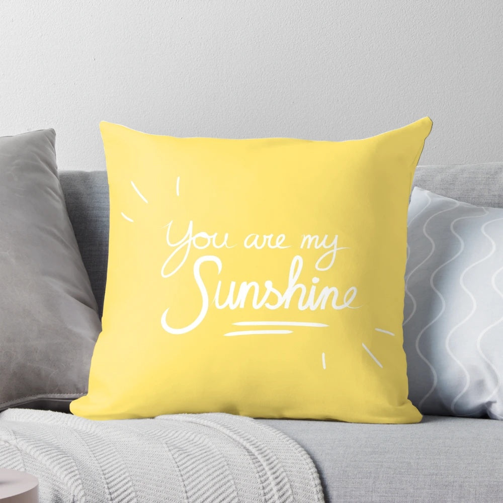 Vibrant "You Are My Sunshine" graphic throw pillow in yellow and white