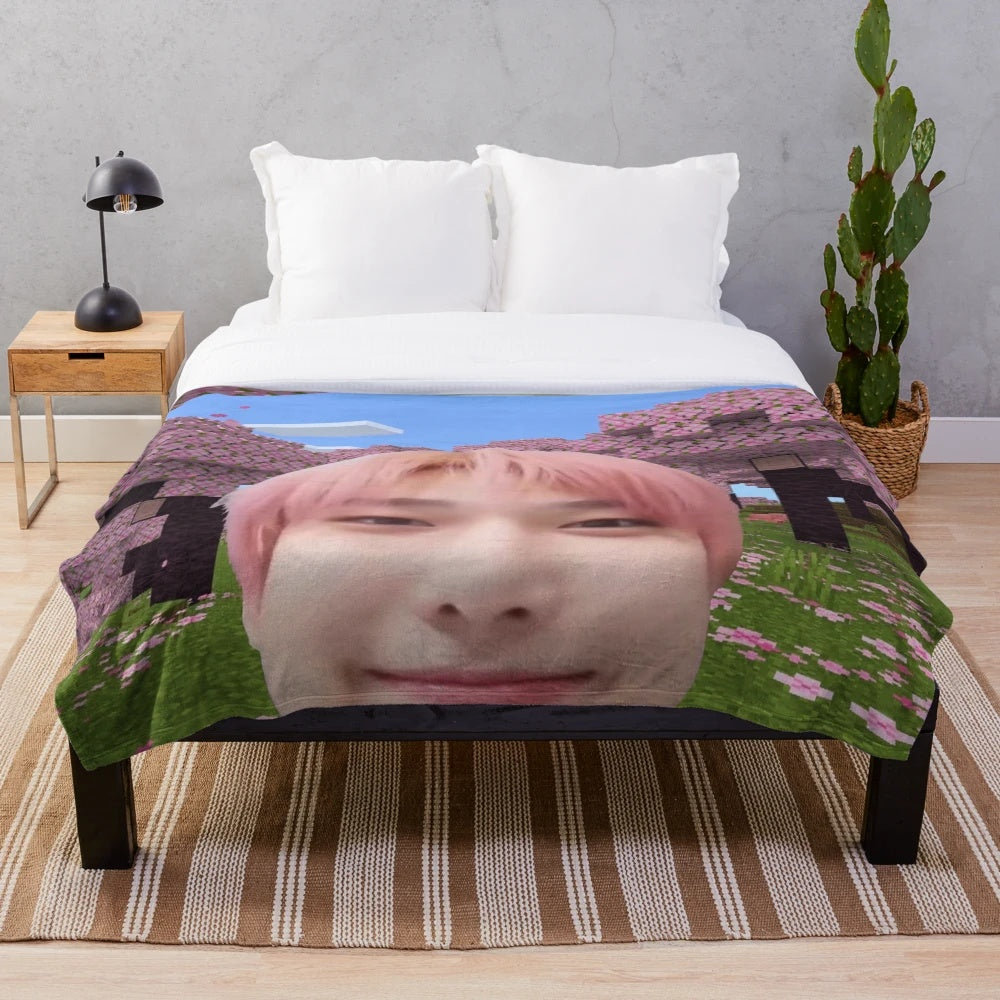 Sunoo's Cherry Blossom Plush Blanket, featuring a soft and cozy design inspired by the popular K-pop group Enhypen