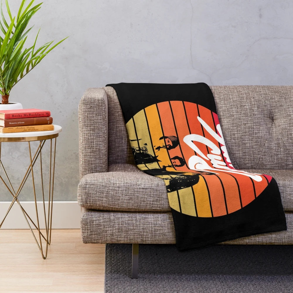 Sunset Curve inspired plush blanket featuring the band logo and characters from the Netflix series Julie and The Phantoms