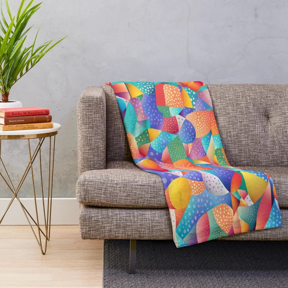 Soft and plush blanket with abstract sunset ocean wave patterns