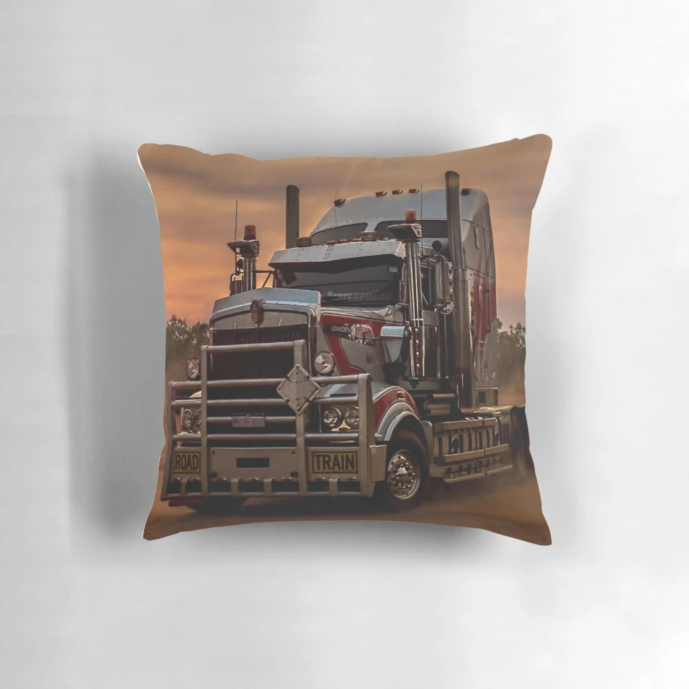A Kenworth prime mover truck captured at sunset in the landscape of Western Australia.