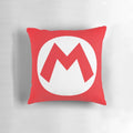 A plush pillow featuring the iconic "M" symbol from the Super Mario video game series, perfect for Halloween decorations or costuming.