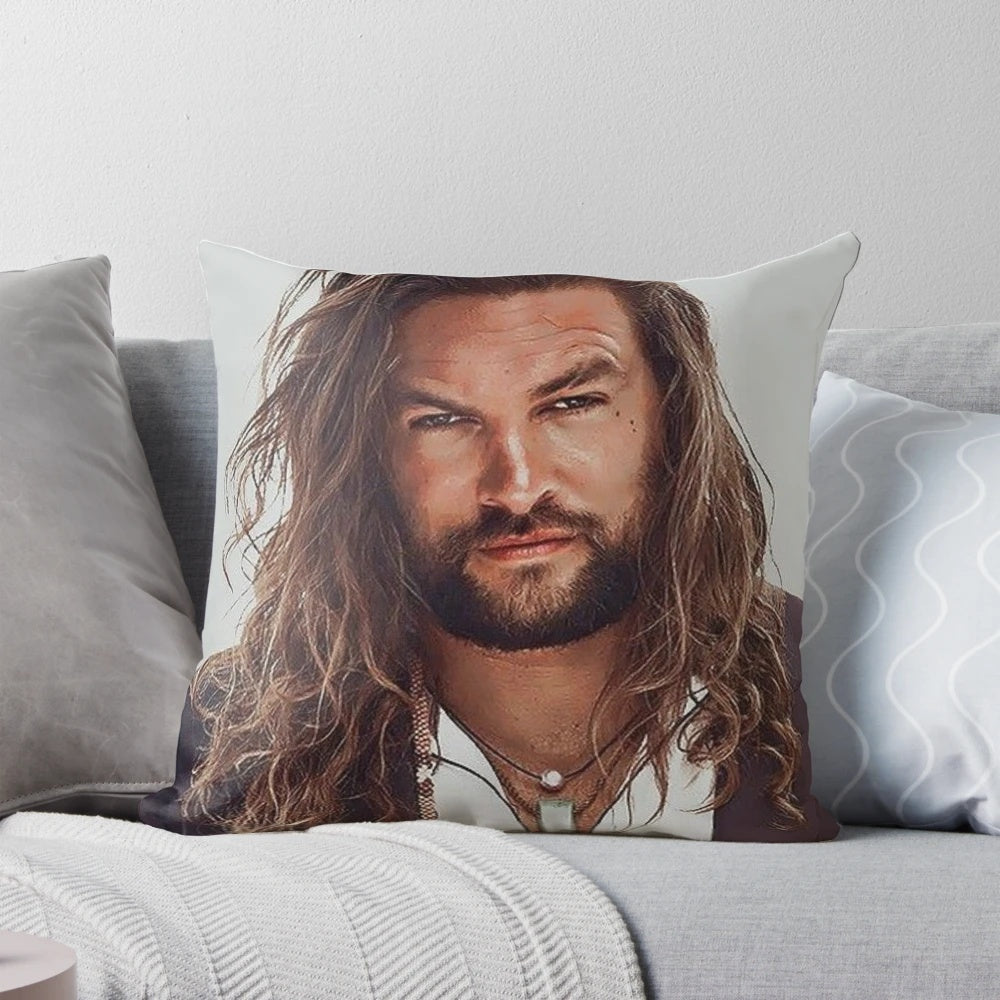 Soft, plush pillow featuring a portrait of actor Jason Momoa, known for his roles in superhero films.