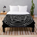 Supernatural-inspired aged plush blanket featuring a devil's trap design