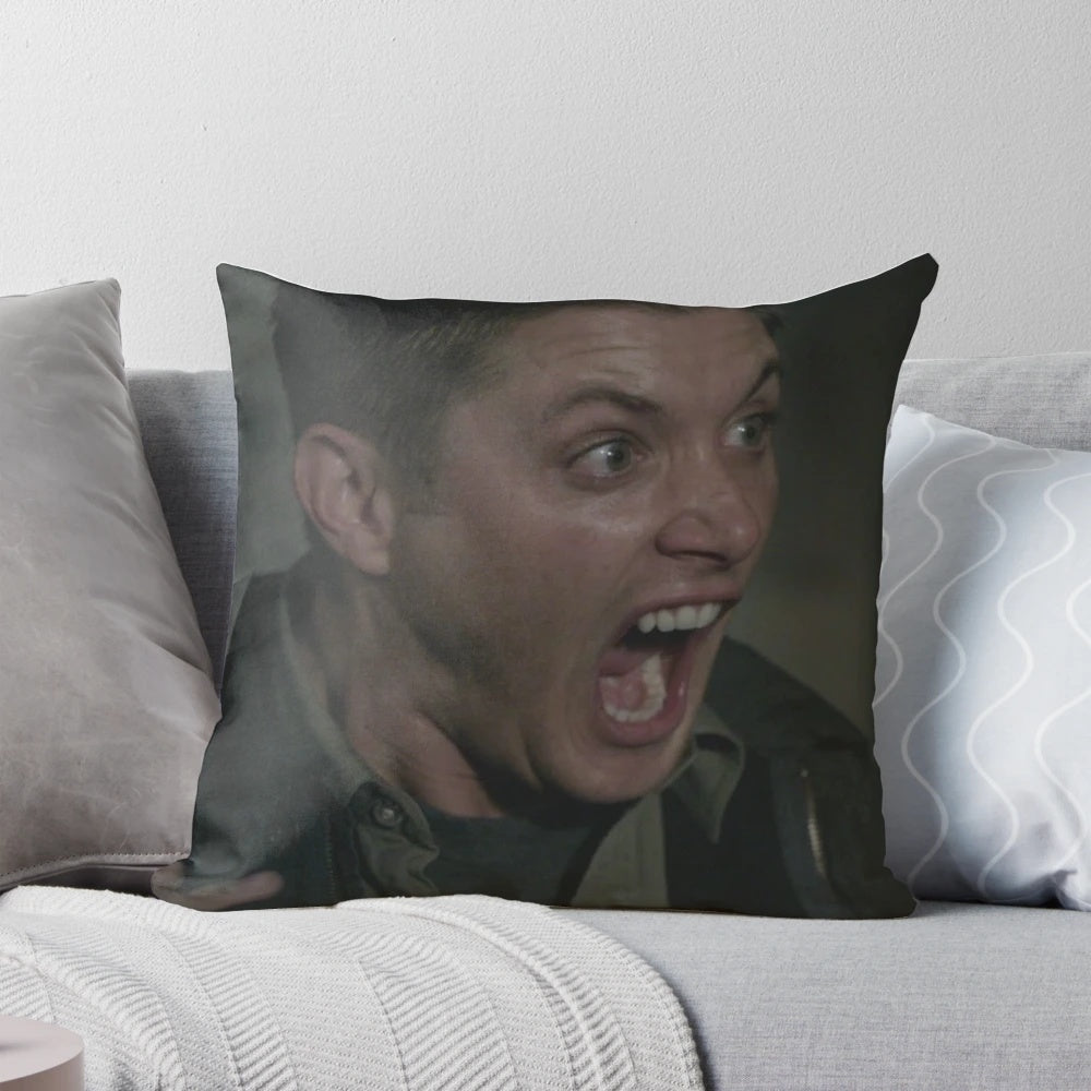 A plush pillow featuring a screaming image of Dean Winchester, the character from the popular TV series Supernatural.