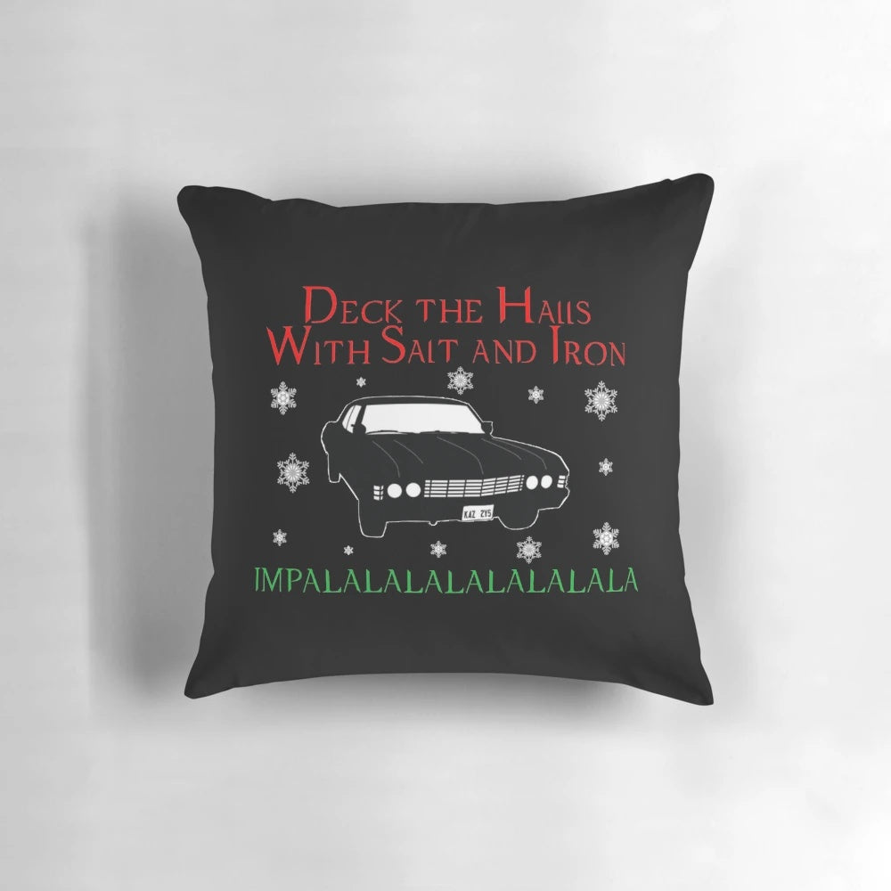 Supernatural-themed Christmas pillow with Impala, Winchester brothers, and Castiel