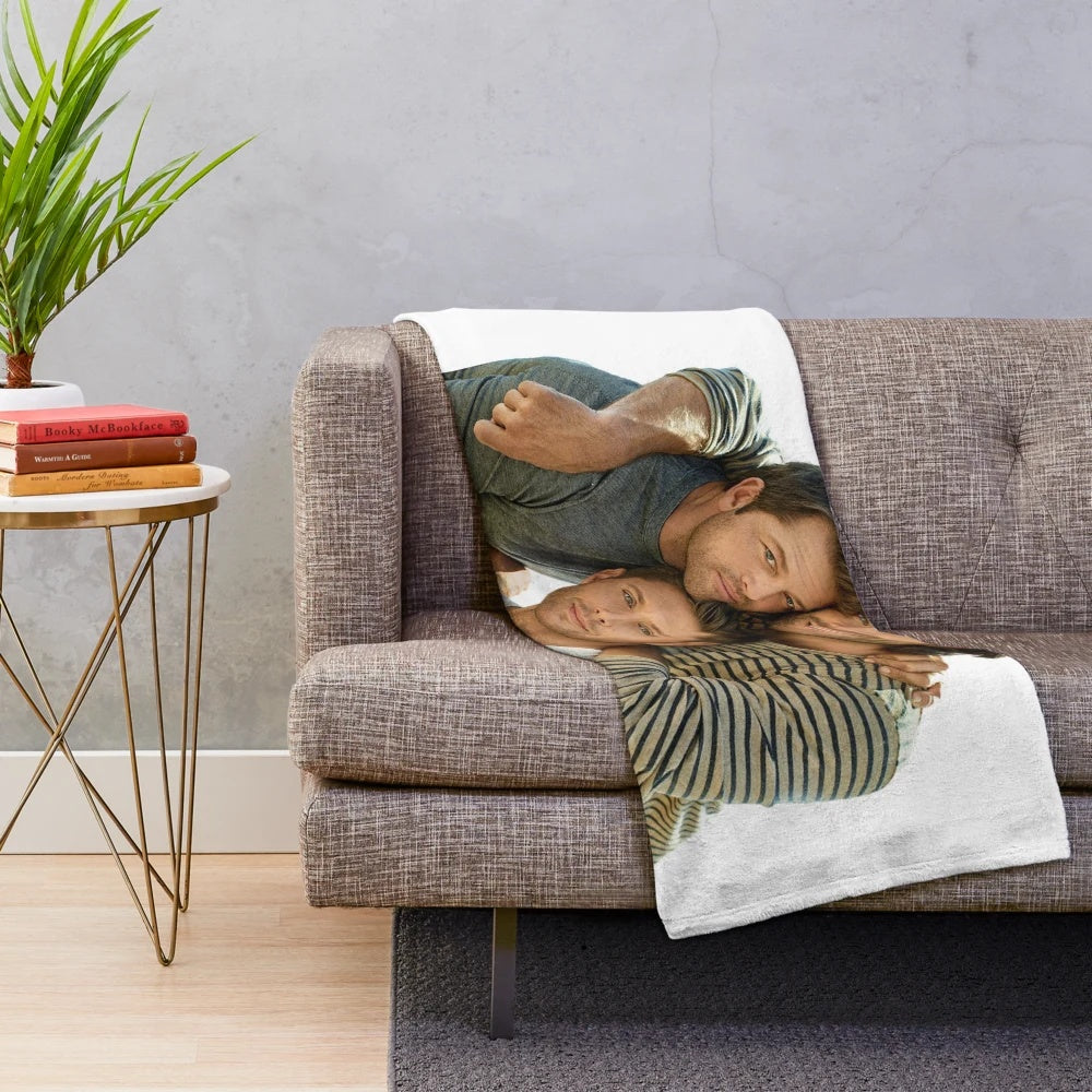 Supernatural-inspired plush blanket with images of Jared Padalecki, Jensen Ackles, and Misha Collins