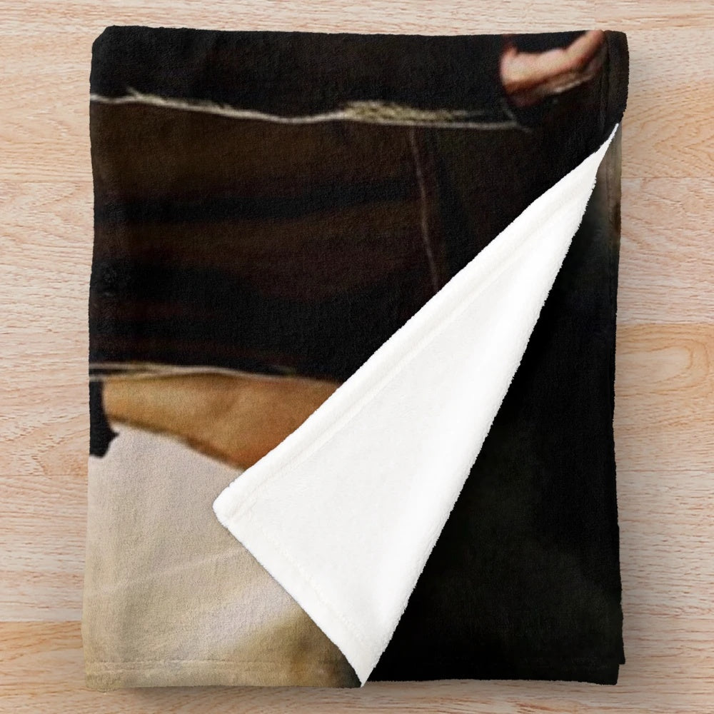 Supernatural-inspired plush blanket featuring Sam, Dean, and Castiel