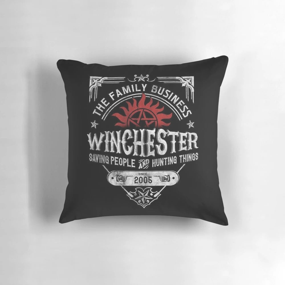 Supernatural-inspired throw pillow featuring the Winchester family and their iconic "Saving people, hunting things" motto