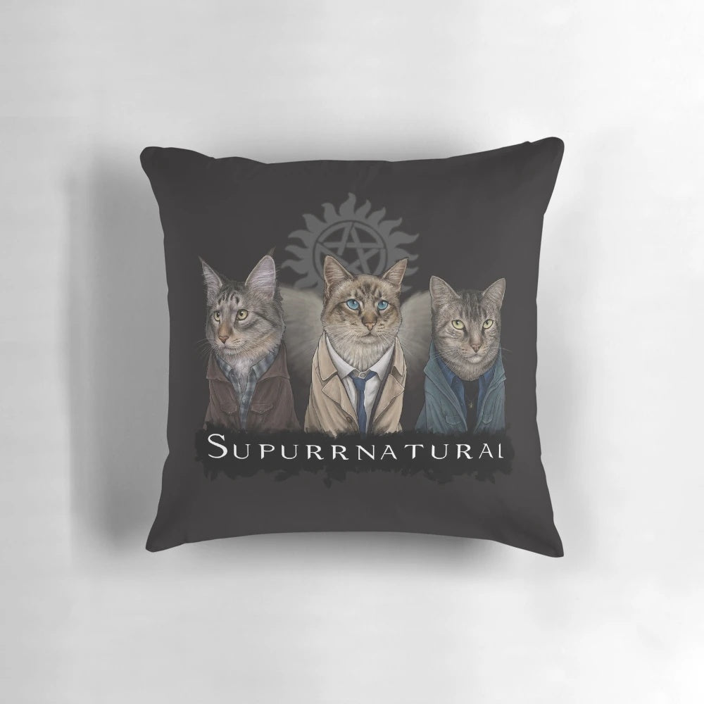Supernatural-themed pillow featuring Sam, Dean, and Castiel with cats