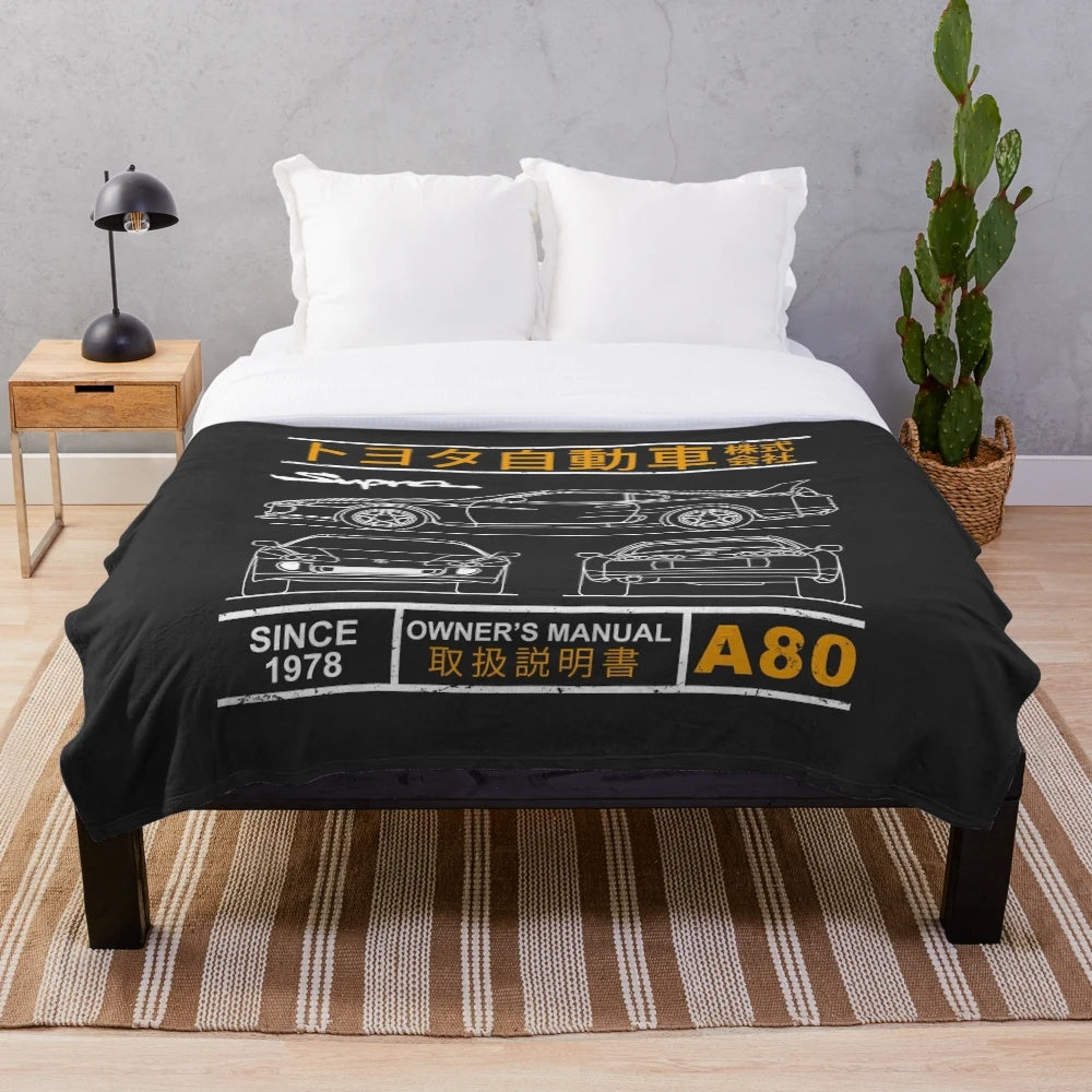 Supra-inspired plush blanket with a detailed car blueprint design