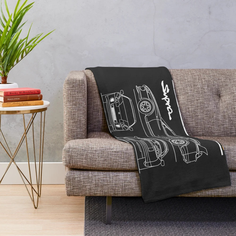 Supra-inspired plush blanket with a detailed car blueprint design