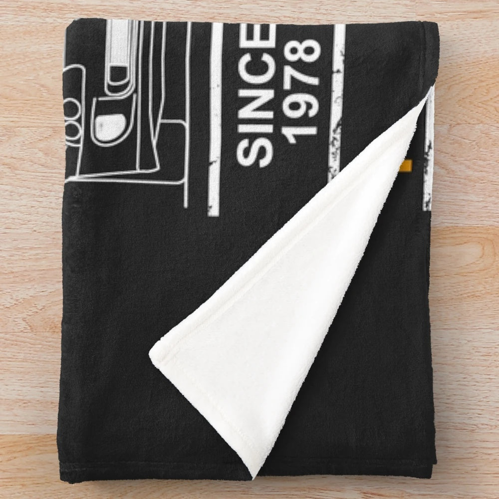 Supra-inspired plush blanket with a detailed car blueprint design