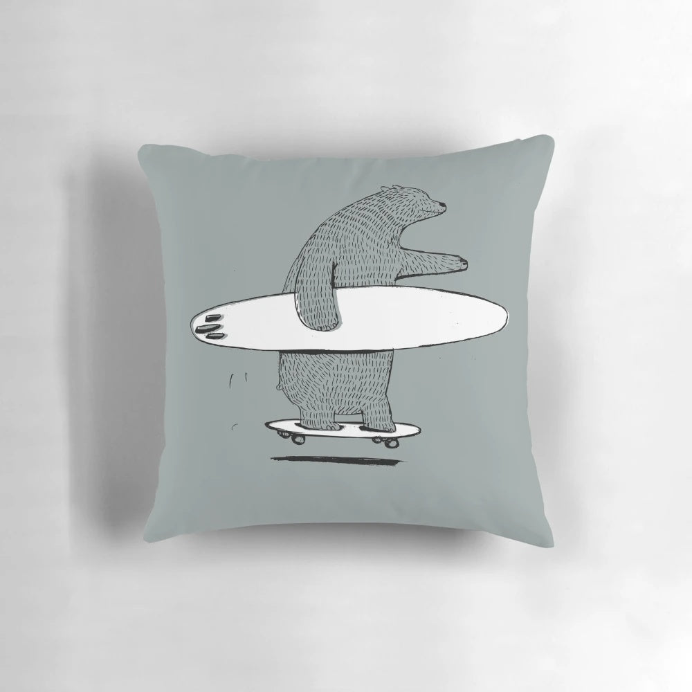 Colorful pillow featuring a surfing and skateboarding design