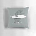 Colorful pillow featuring a surfing and skateboarding design