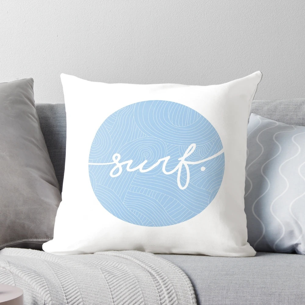 A soft, round pillow with a swirling blue and white pattern, inspired by the waves and surf lifestyle.