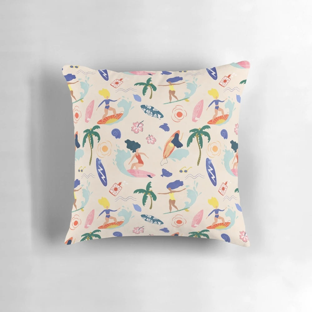 Colorful and vibrant 'Surfing Girl' pillow with a surfer riding a wave on a beach background