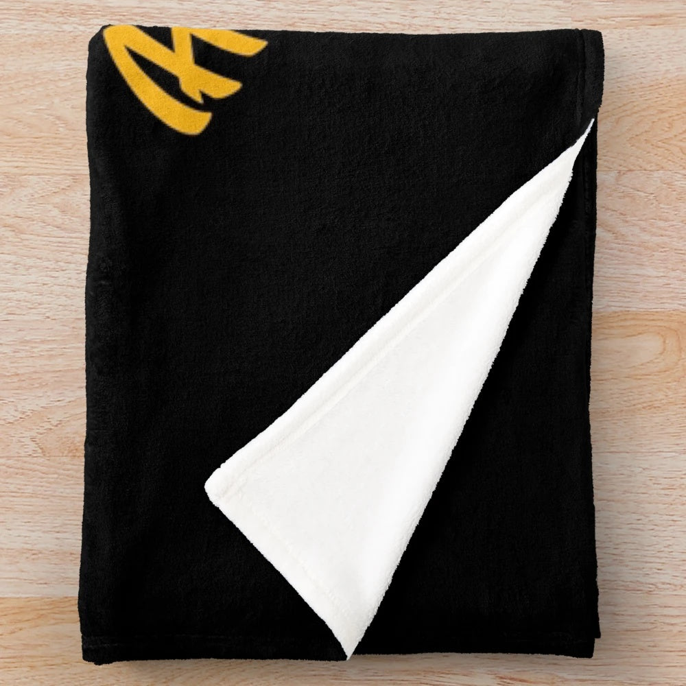 Plush blanket with surf-inspired design and text