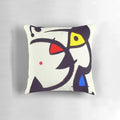 Abstract surreal art pillow featuring the style and imagery of Spanish artist Joan Miró