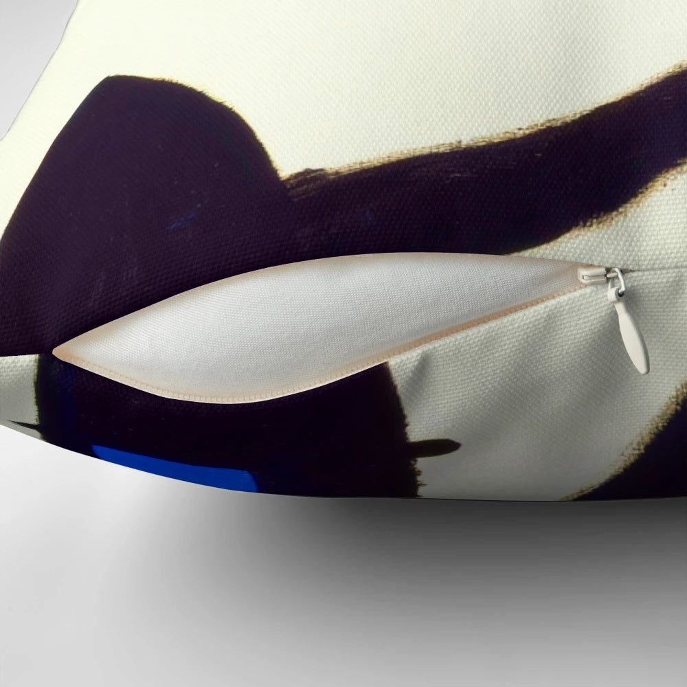 Abstract surreal art pillow featuring the style and imagery of Spanish artist Joan Miró