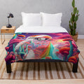 Surreal astronaut plush blanket featuring intergalactic and alien world design