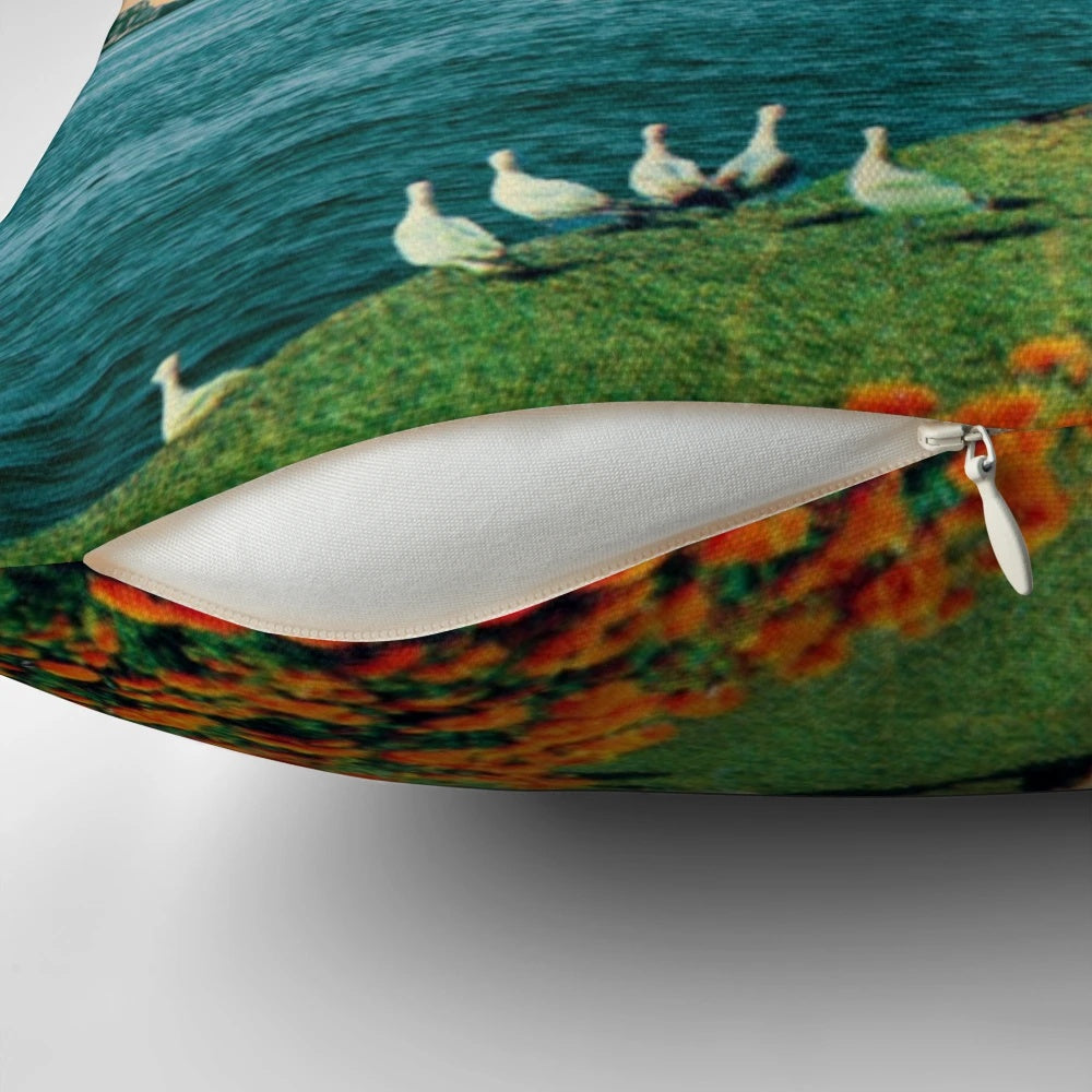 A surreal, dreamlike pillow featuring a collage of planets, stars, and a woman against a backdrop of the ocean and flowers.