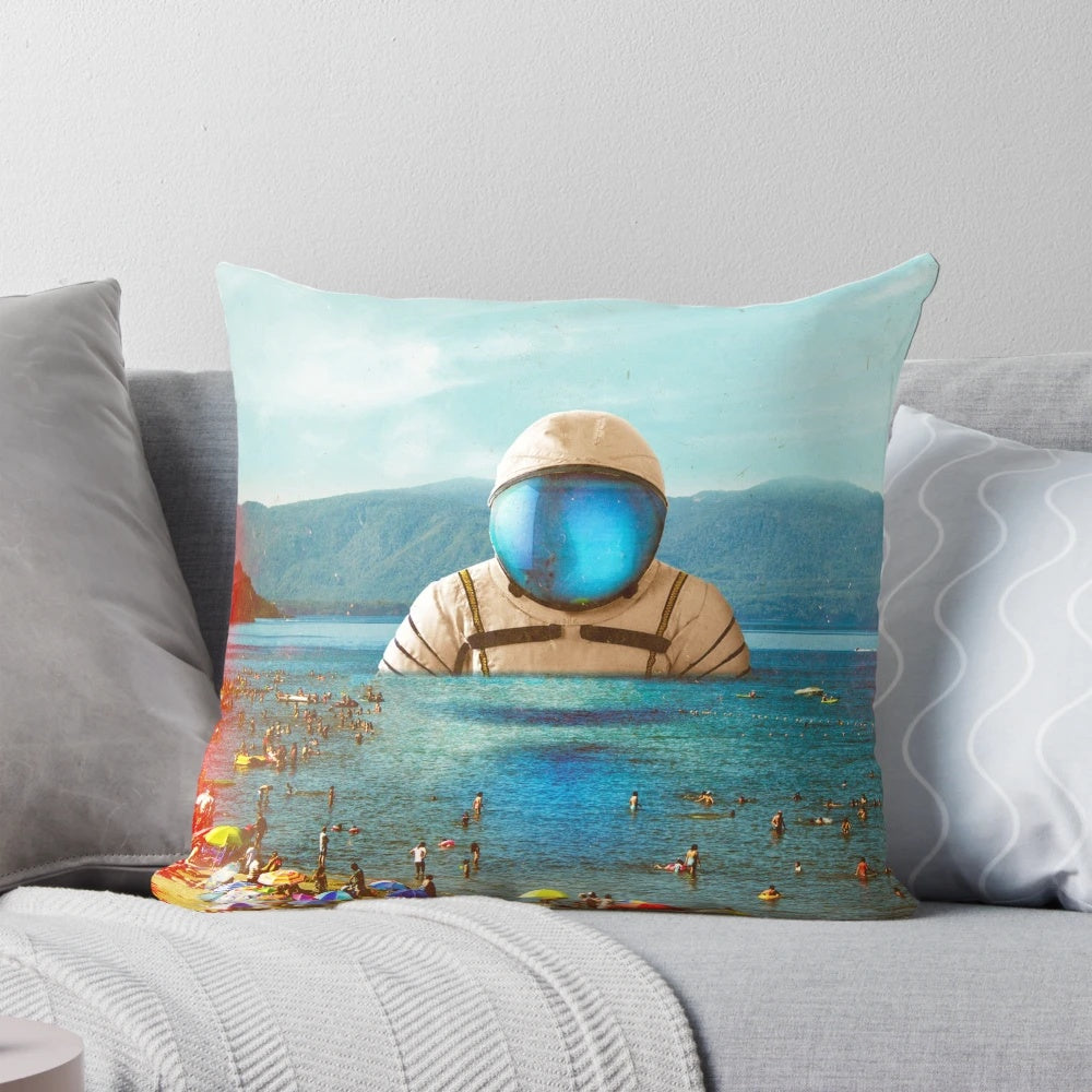 Surreal digital collage pillow featuring an astronaut on a beach against a futuristic, cosmic landscape.