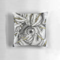 Surreal art pillow featuring a disembodied eye, skull, and hands in an Escher-inspired design.