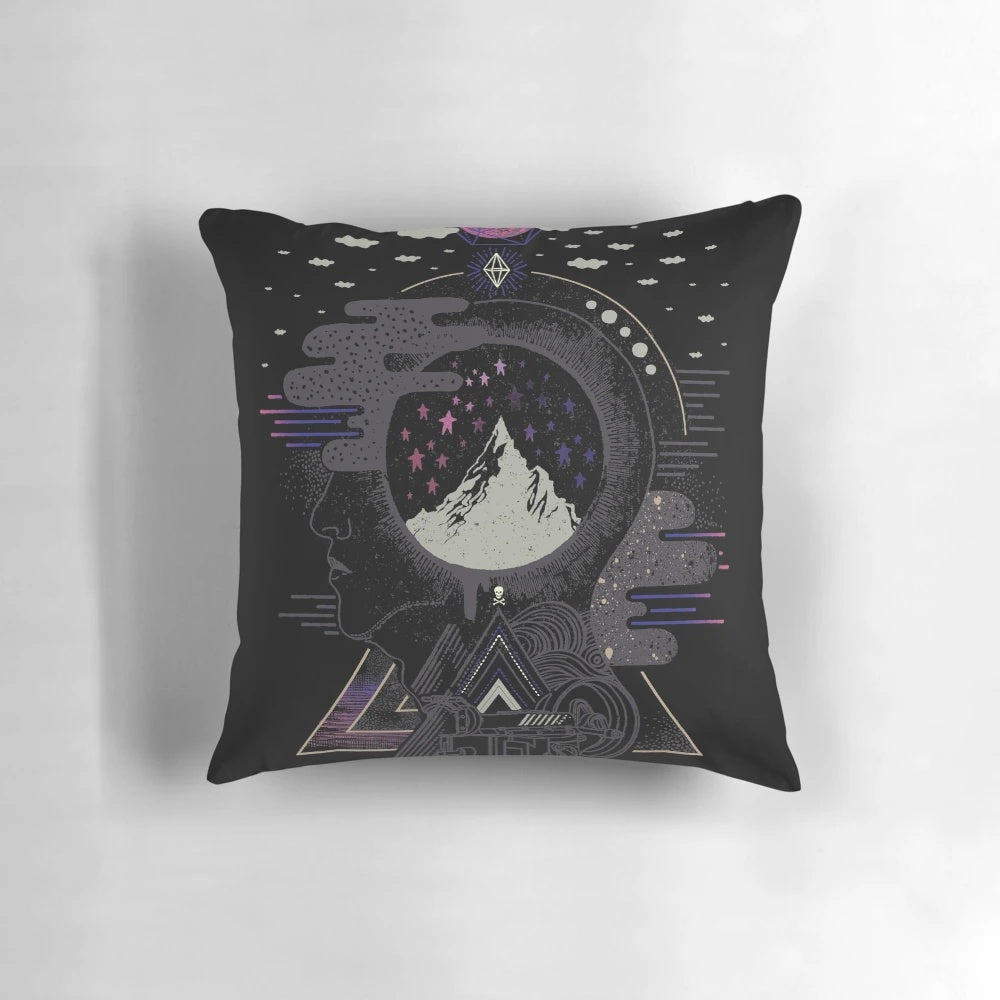 Soft and plush surreal dream pillow with a galaxy and space design, perfect for relaxing and recharging.