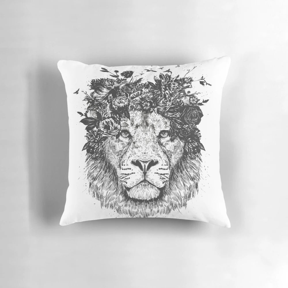 Throw pillow featuring a surreal illustration of a floral lion in black and white