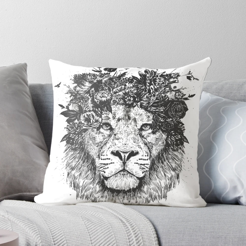 Throw pillow featuring a surreal illustration of a floral lion in black and white