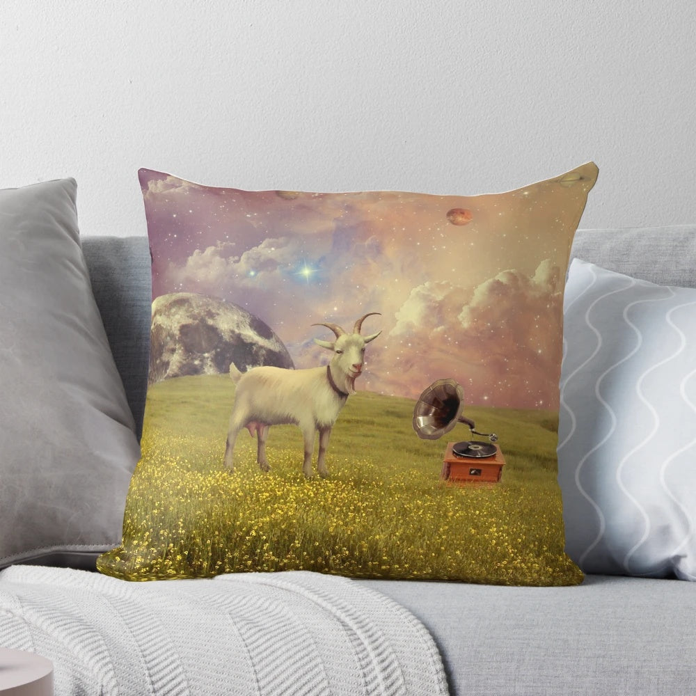 A colorful, surreal collage pillow featuring a goat in a celestial space scene with the moon, clouds, and planets.