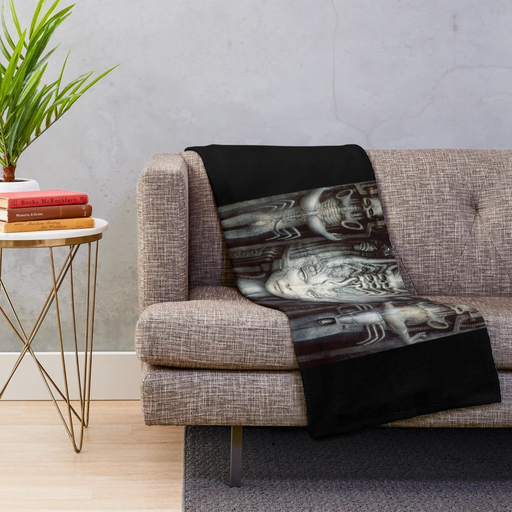 Plush blanket featuring H.R. Giger's surreal Li 1 art design