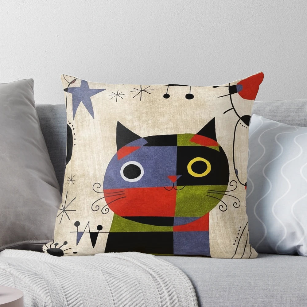 Vibrant throw pillow featuring the iconic surrealist art of Spanish artist Joan Miro