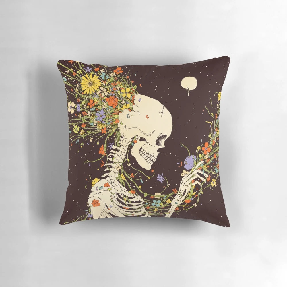 Surreal pillow with skull, flowers, and celestial elements representing the life that could have been.