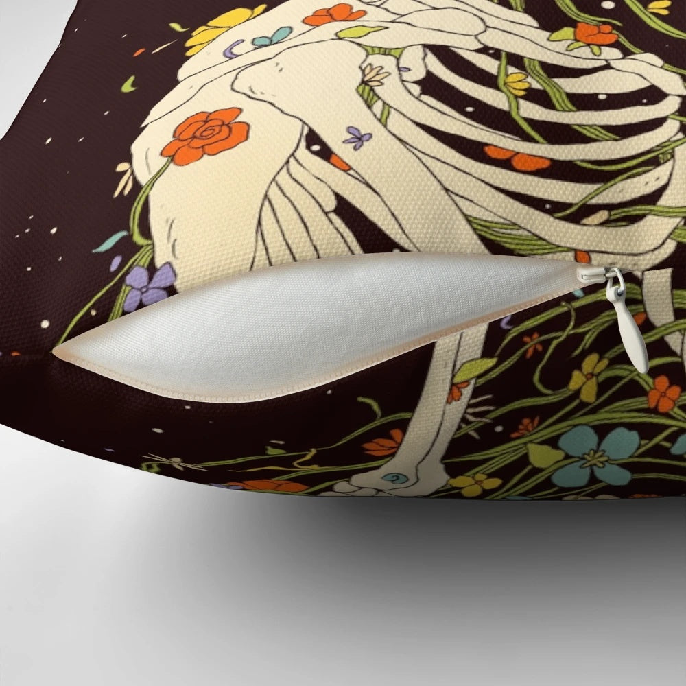Surreal pillow with skull, flowers, and celestial elements representing the life that could have been.