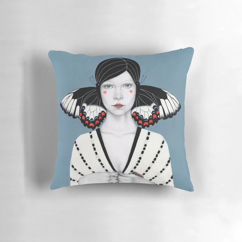 Mila Pillow with surreal, fantasy design featuring a woman's portrait with butterfly wings