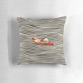 A surreal, optical illusion-style collage pillow design featuring a retro boat or canoe.