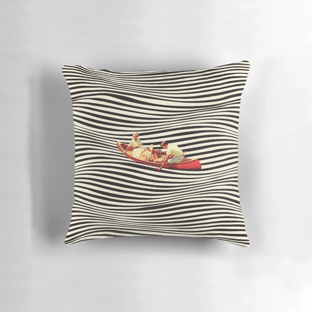 A surreal, optical illusion-style collage pillow design featuring a retro boat or canoe.